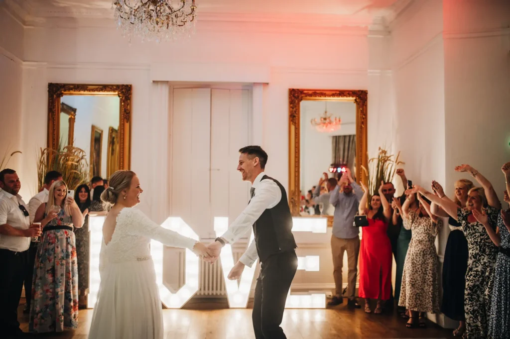 BAWTRY HALL WEDDING PHOTOGRAPHER CAKE CUT AND FORST dance