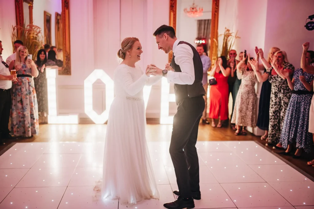 BAWTRY HALL WEDDING PHOTOGRAPHER CAKE CUT AND FORST dance