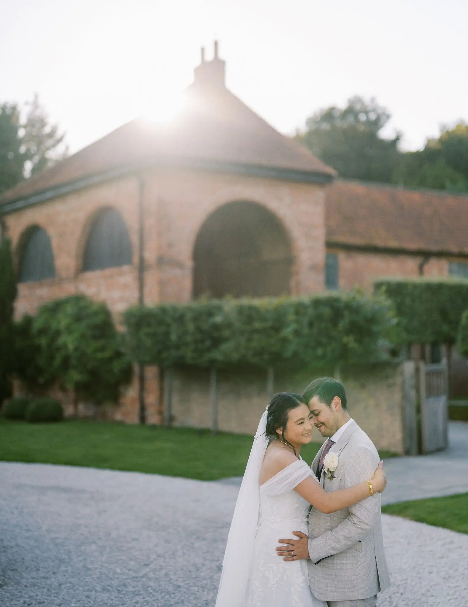 Bride and groom cuddle at Hazel Gap Barn