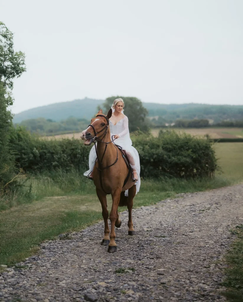 bride arrivng on horse back at Low Osgoodby Grange Wedding Photographer