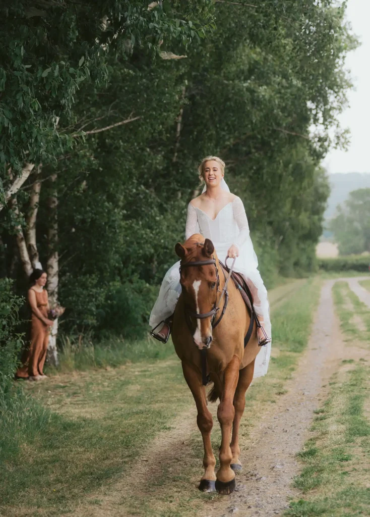 bride arrivng on horse back at Low Osgoodby Grange Wedding Photography
