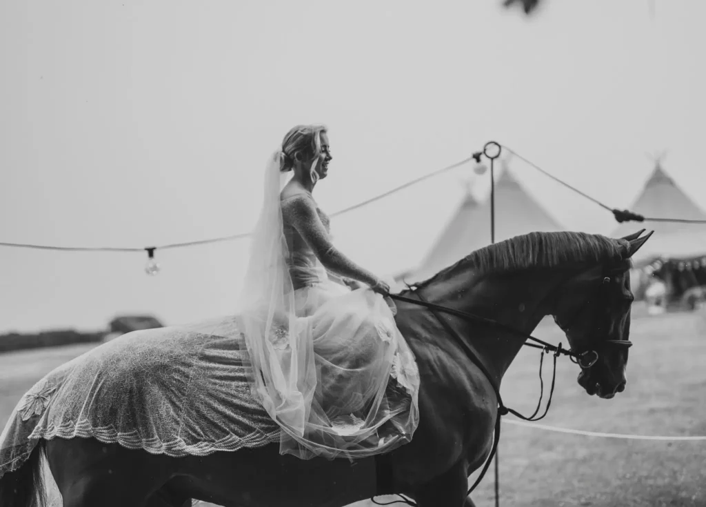 bride arrivng on horse back at Low Osgoodby Grange Wedding Photography