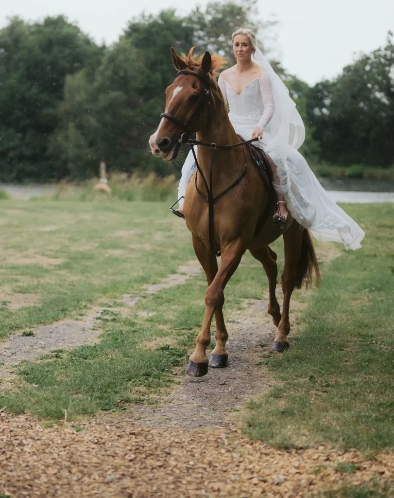 bride arrivng on horse back at Low Osgoodby Grange Wedding Photography
