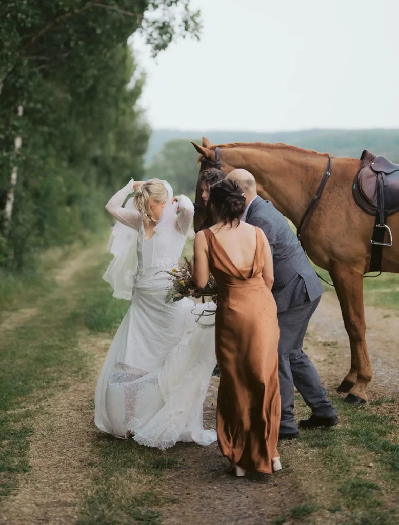 bride arrivng on horse back at Low Osgoodby Grange Wedding Photography