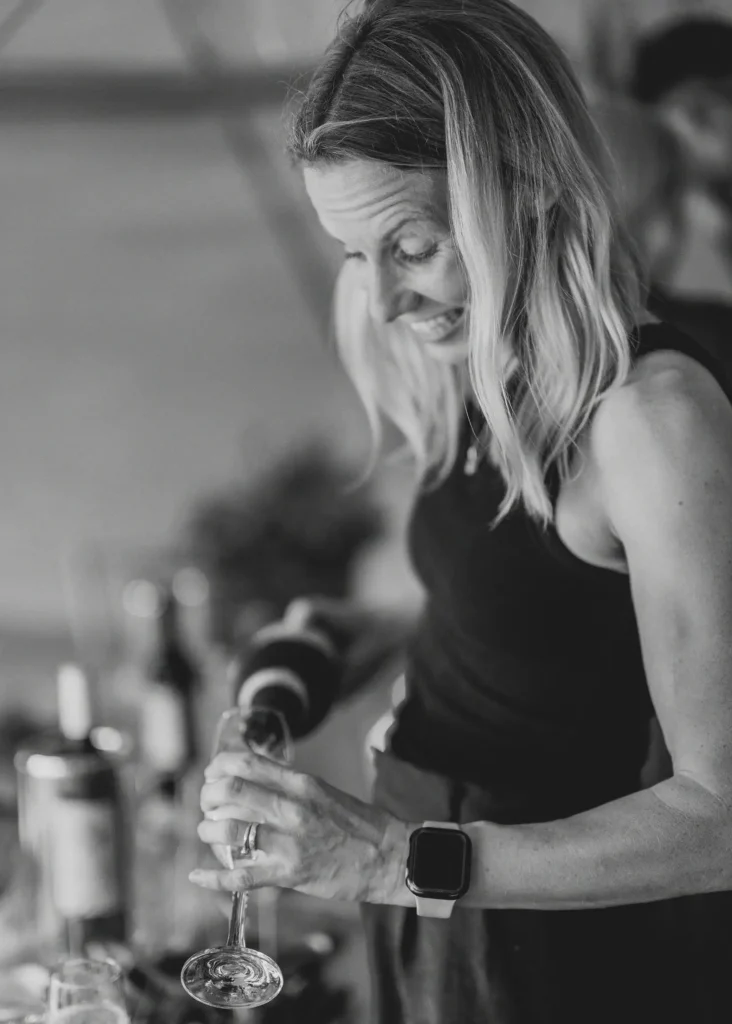 charlie pouring champagne at Low Osgoodby Grange Wedding Photographer