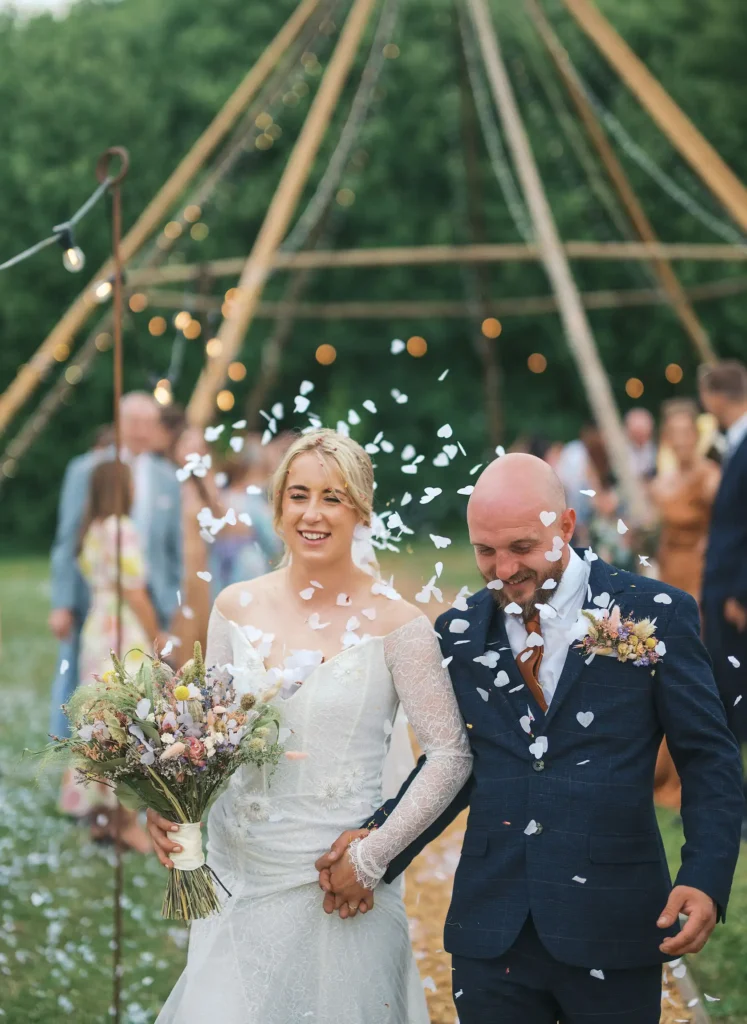 confetti on bride and groom at Low Osgoodby Grange Wedding Photographer