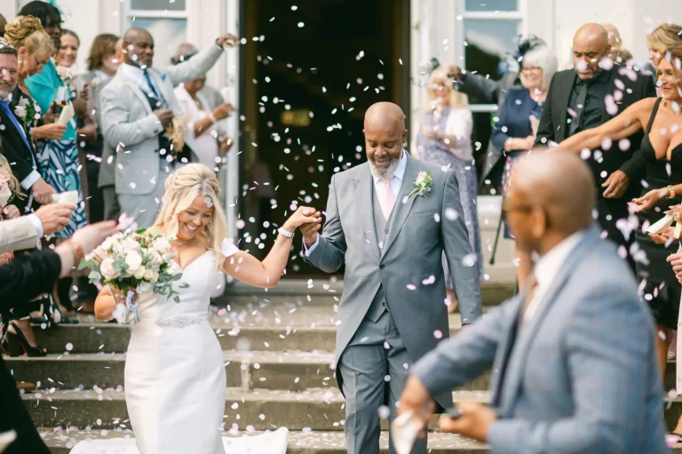 confetti toss at owston hall by by yorkshire portraits wedding photographer