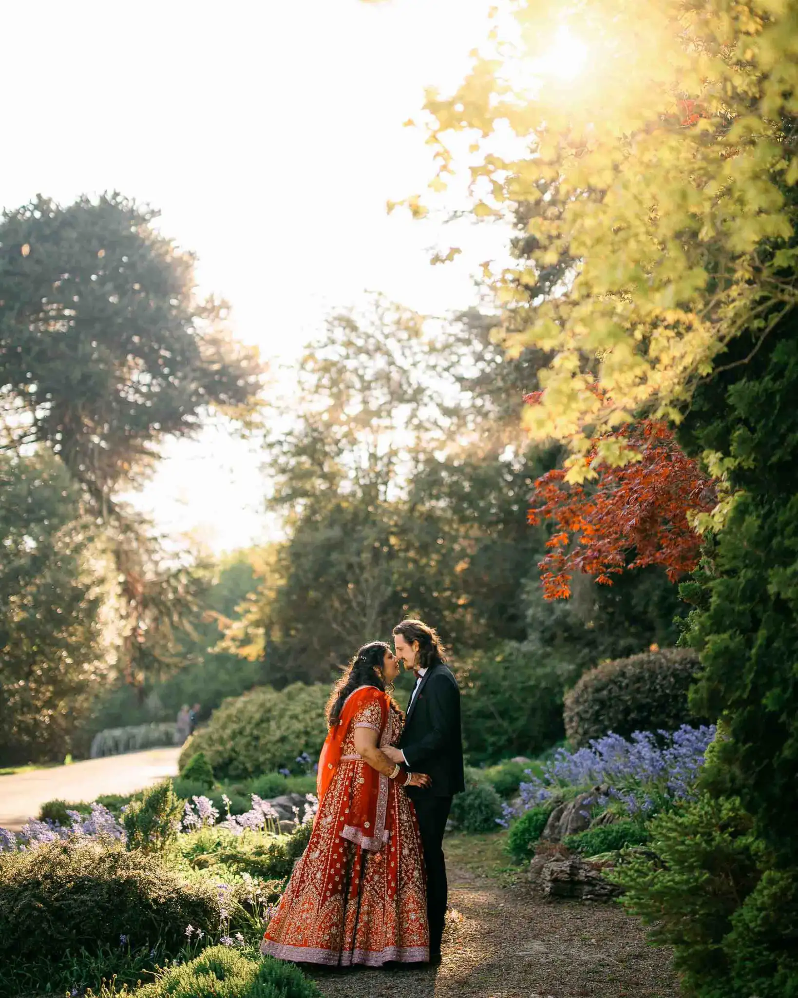 sun pavillion wedding photographer asian bride and english groom in sunet gardens