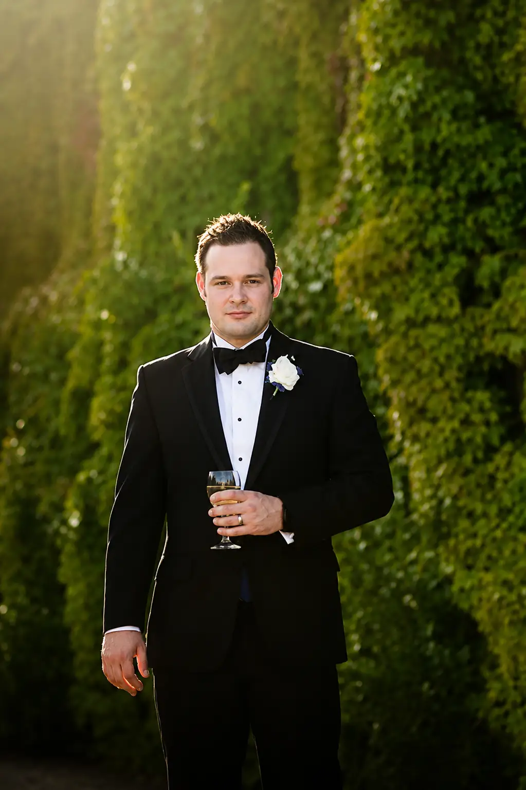Groom photographed by Carlton Towers wedding photographer in tuxedos